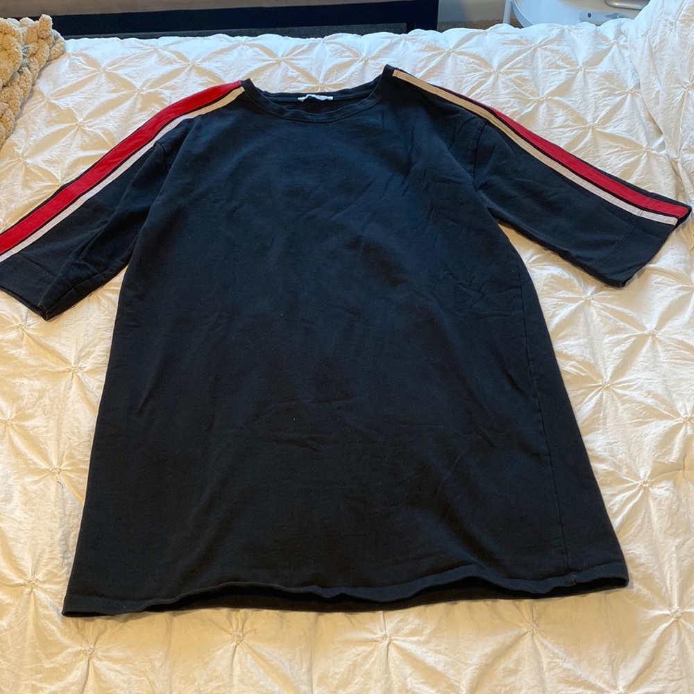 Black, heavyweight t-shirt dress with red/white stripes on the sleeves.